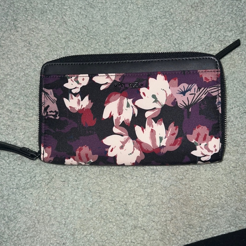 TUMI travel wallet never used